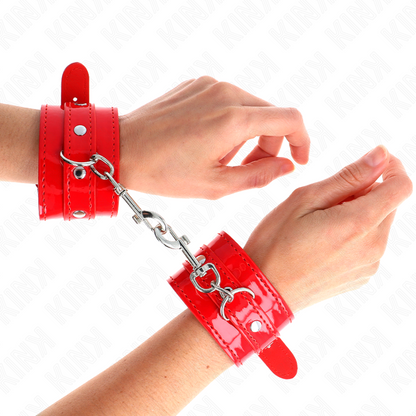 Manette da polso con borchie rosse KINK - Design regolabile per comfort e stile nelle sessioni BDSM